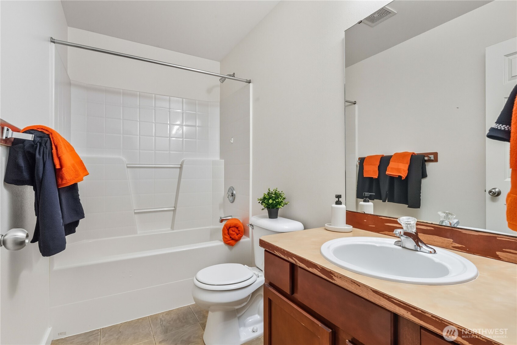 18312 8th Avenue Southeast Bothell, WA 98012 - Photo 26 of 39 a bathroom with a sink a toilet and a bathtub