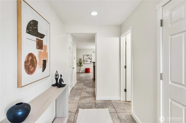 a view of a storage & utility room with sink washer and dryer