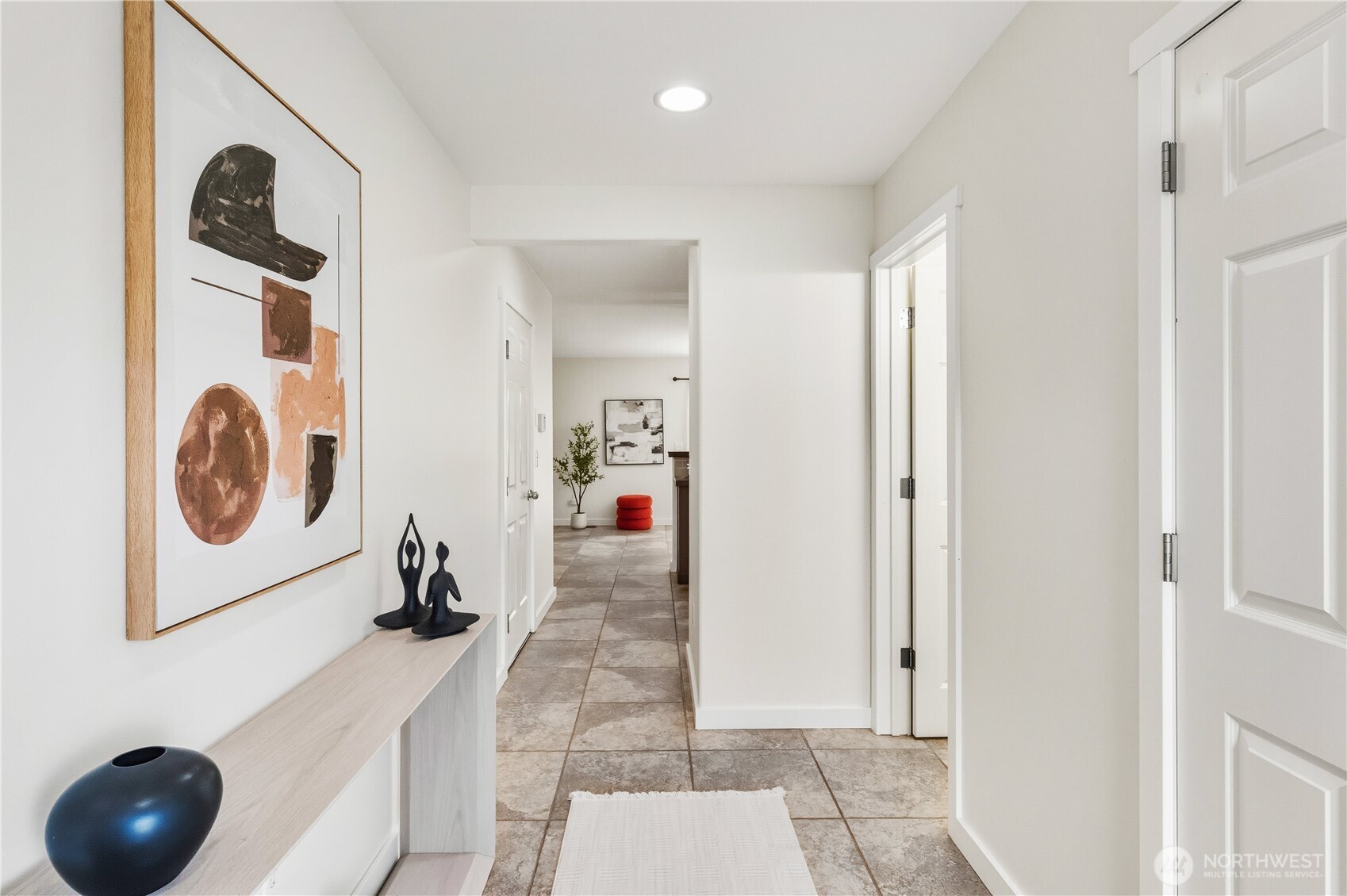 18312 8th Avenue Southeast Bothell, WA 98012 - Photo 3 of 39 a view of a storage & utility room with sink washer and dryer