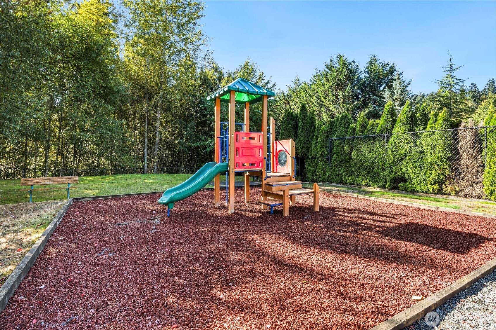 18312 8th Avenue Southeast Bothell, WA 98012 - Photo 32 of 39 a flag is sitting in the middle of a park