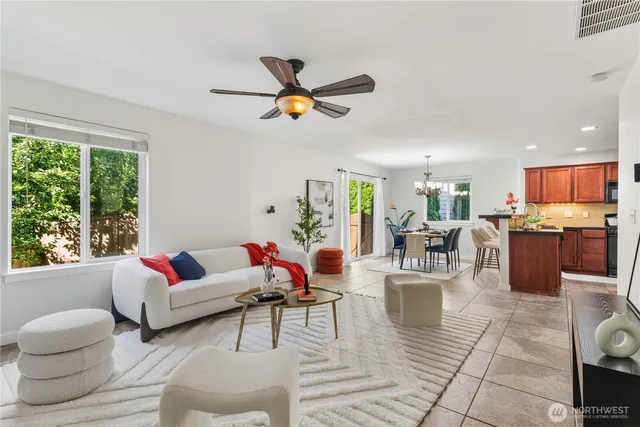 a living room with furniture and a window