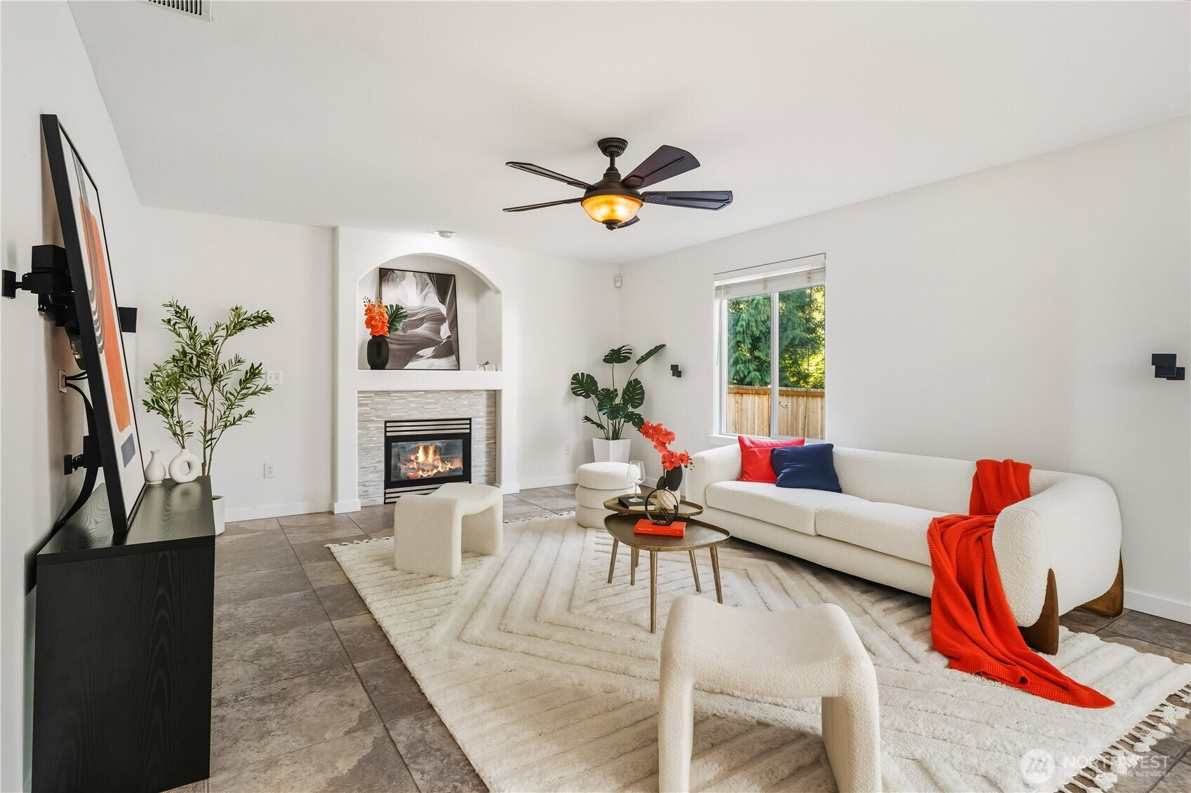 18312 8th Avenue Southeast Bothell, WA 98012 - Photo 6 of 39 a living room with furniture a fireplace and potted plants