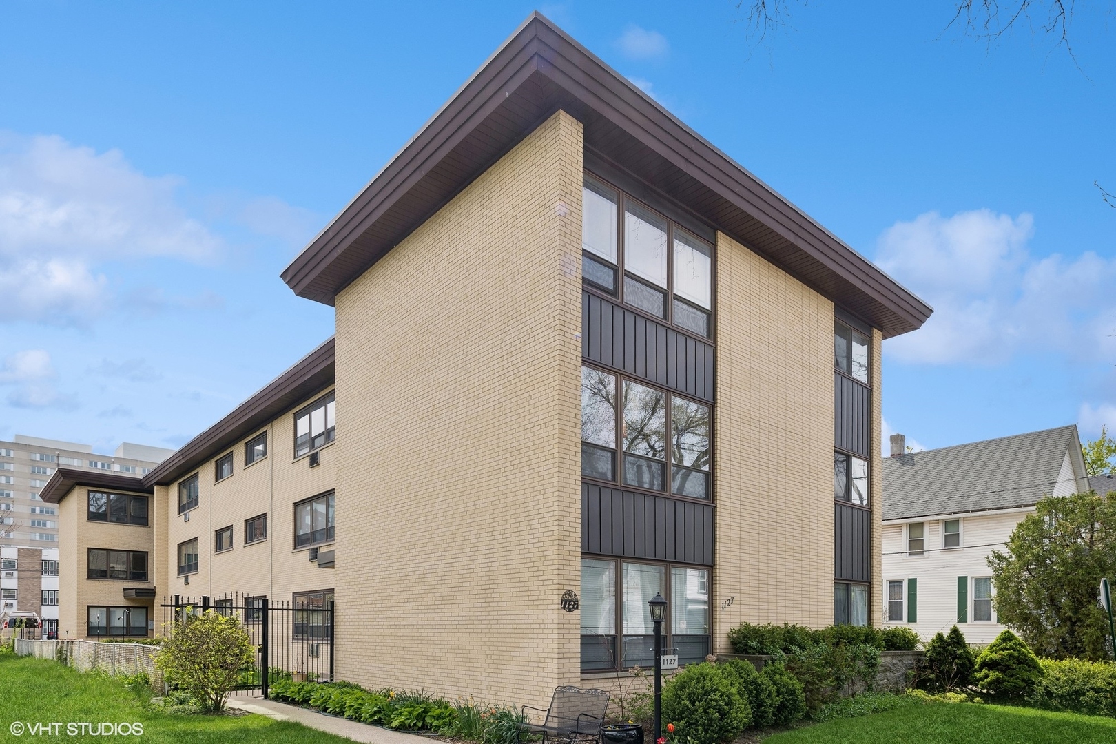 1127 West Erie Street, Unit 1C Chicago, IL 60642 - Photo 1 of 18 a view of building with yard