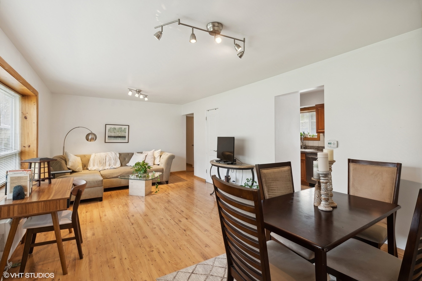 1127 West Erie Street, Unit 1C Chicago, IL 60642 - Photo 5 of 18 a living room with furniture and a flat screen tv