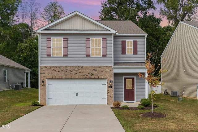 a picture of a bench in front of a building