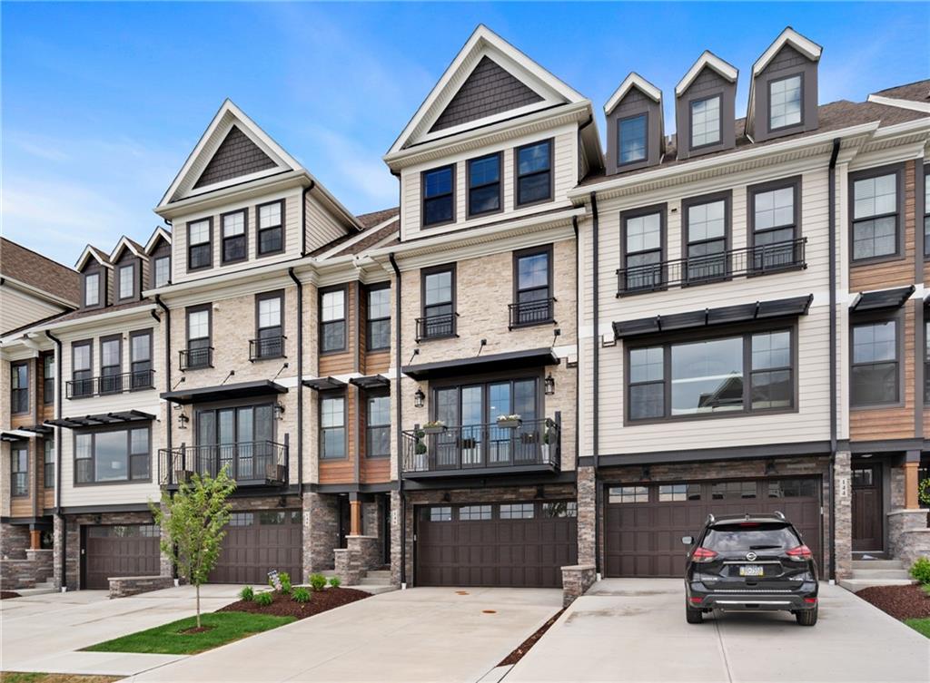 146 Enclave Drive Mars, PA 16046 - Photo 2 of 43 a car parked in front of a brick building