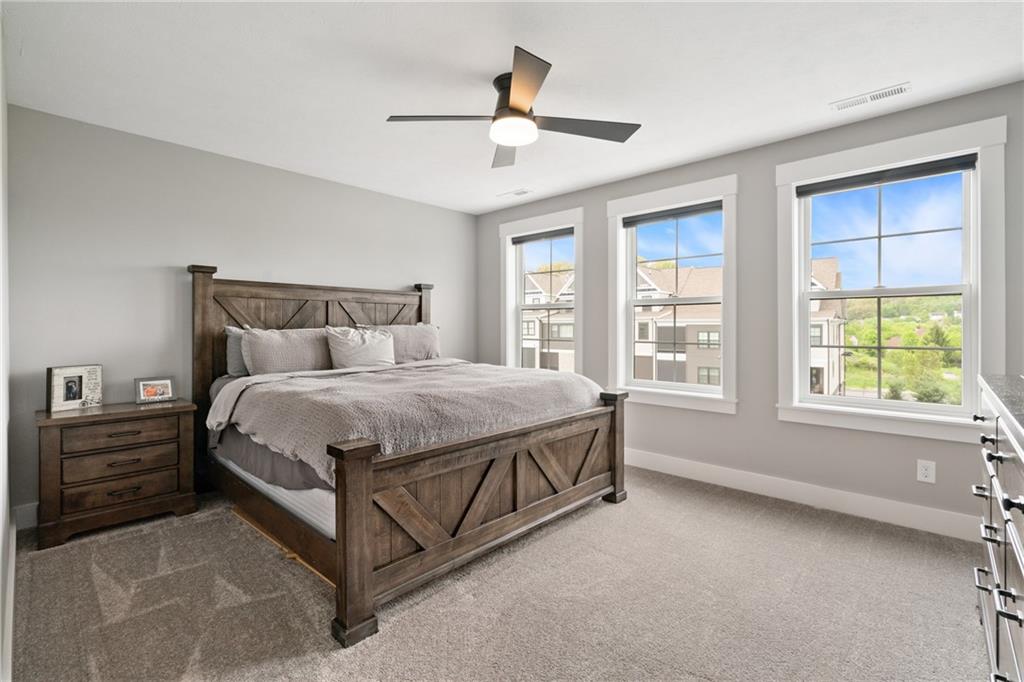 146 Enclave Drive Mars, PA 16046 - Photo 22 of 43 a spacious bedroom with a bed and a window