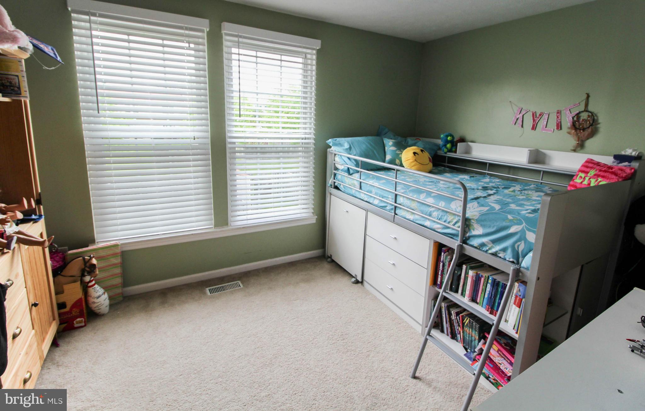 2242 Riding Crop Way Baltimore, MD 21244 - Photo 20 of 20 a bedroom with furniture and a window