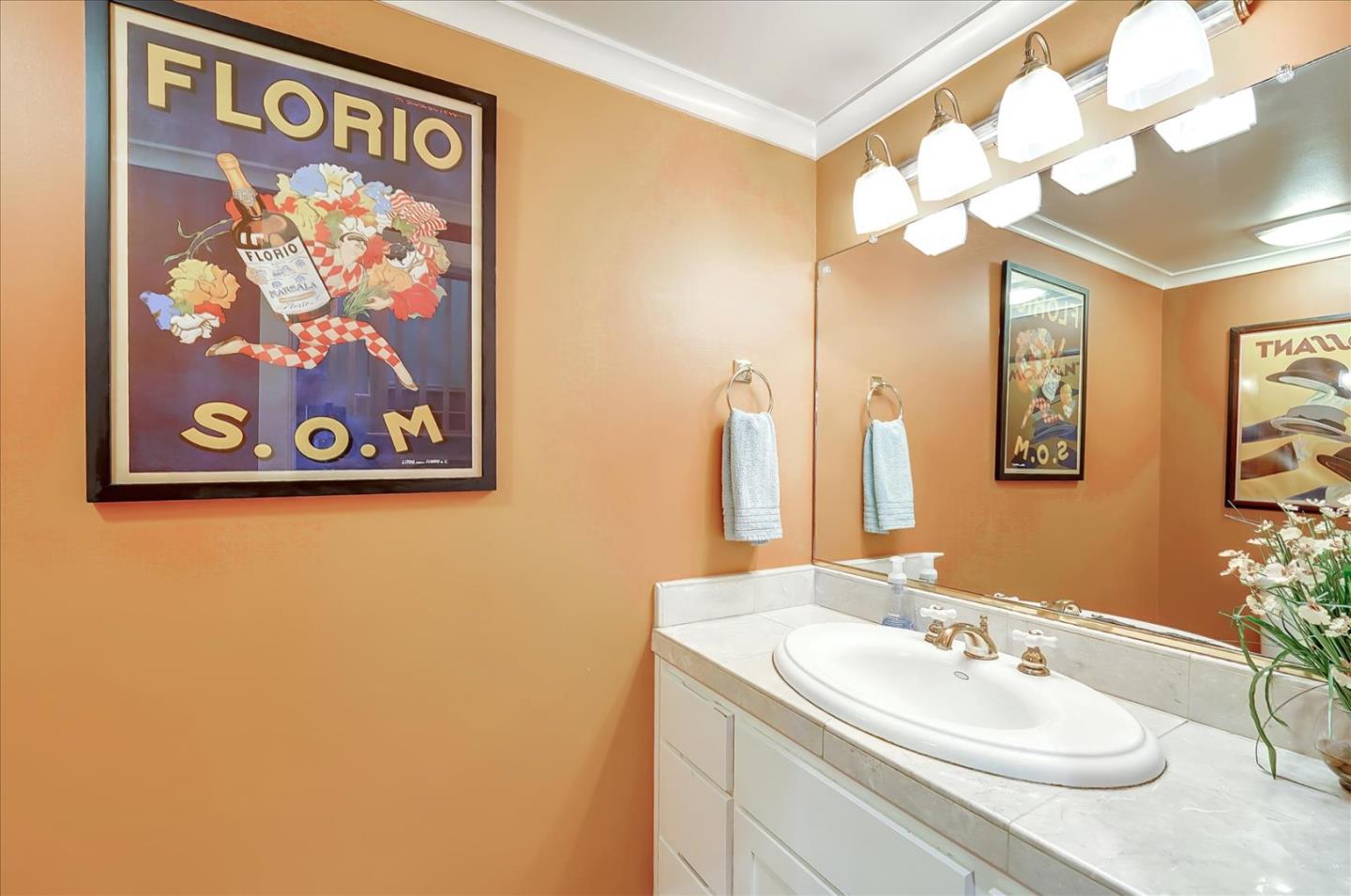 1166 Elysian Place San Jose, CA 95125 - Photo 11 of 46 a bathroom with a sink and a mirror