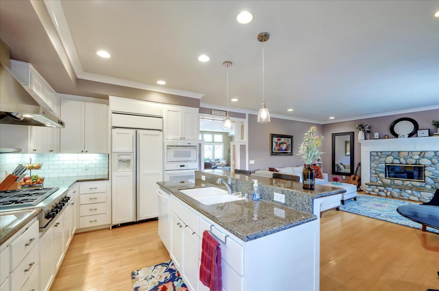 1166 Elysian Place San Jose, CA 95125 - Photo 12 of 46 a open kitchen with stainless steel appliances granite countertop a sink stove and refrigerator