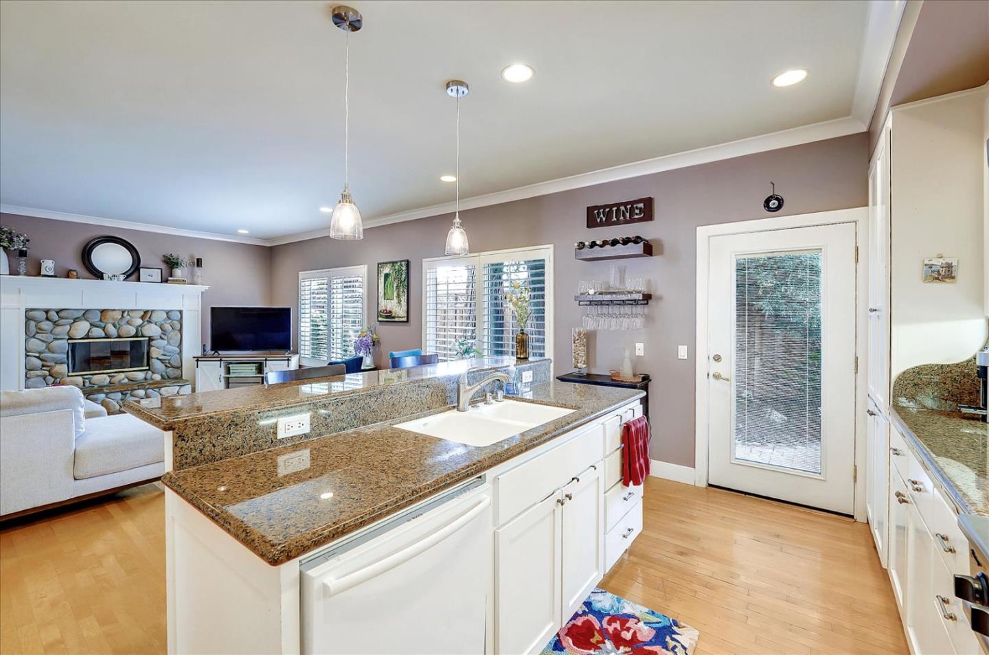 1166 Elysian Place San Jose, CA 95125 - Photo 14 of 46 a kitchen with a stove a sink and a refrigerator