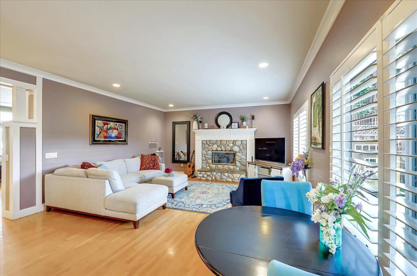 1166 Elysian Place San Jose, CA 95125 - Photo 15 of 46 a living room with furniture flower pot and a fireplace
