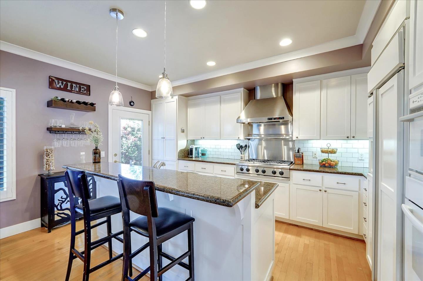 1166 Elysian Place San Jose, CA 95125 - Photo 16 of 46 a kitchen with stainless steel appliances granite countertop a stove a sink dishwasher and a refrigerator
