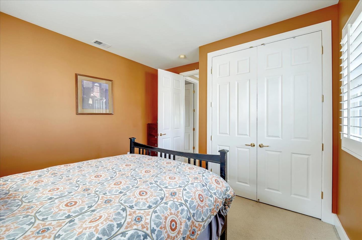 1166 Elysian Place San Jose, CA 95125 - Photo 27 of 46 a bedroom with a bed and a window