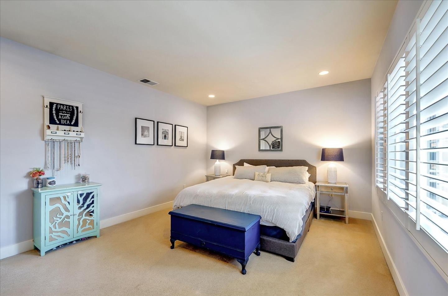 1166 Elysian Place San Jose, CA 95125 - Photo 30 of 46 a bedroom with a bed and a lamp on table