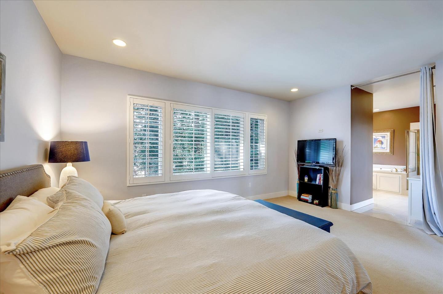 1166 Elysian Place San Jose, CA 95125 - Photo 31 of 46 a bedroom with a bed and a television