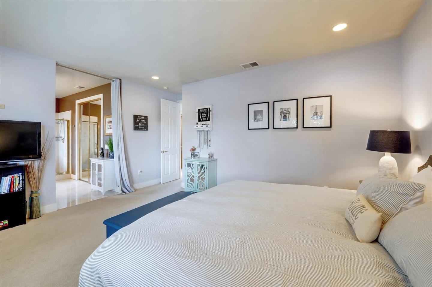 1166 Elysian Place San Jose, CA 95125 - Photo 32 of 46 a bedroom with a large bed and a television