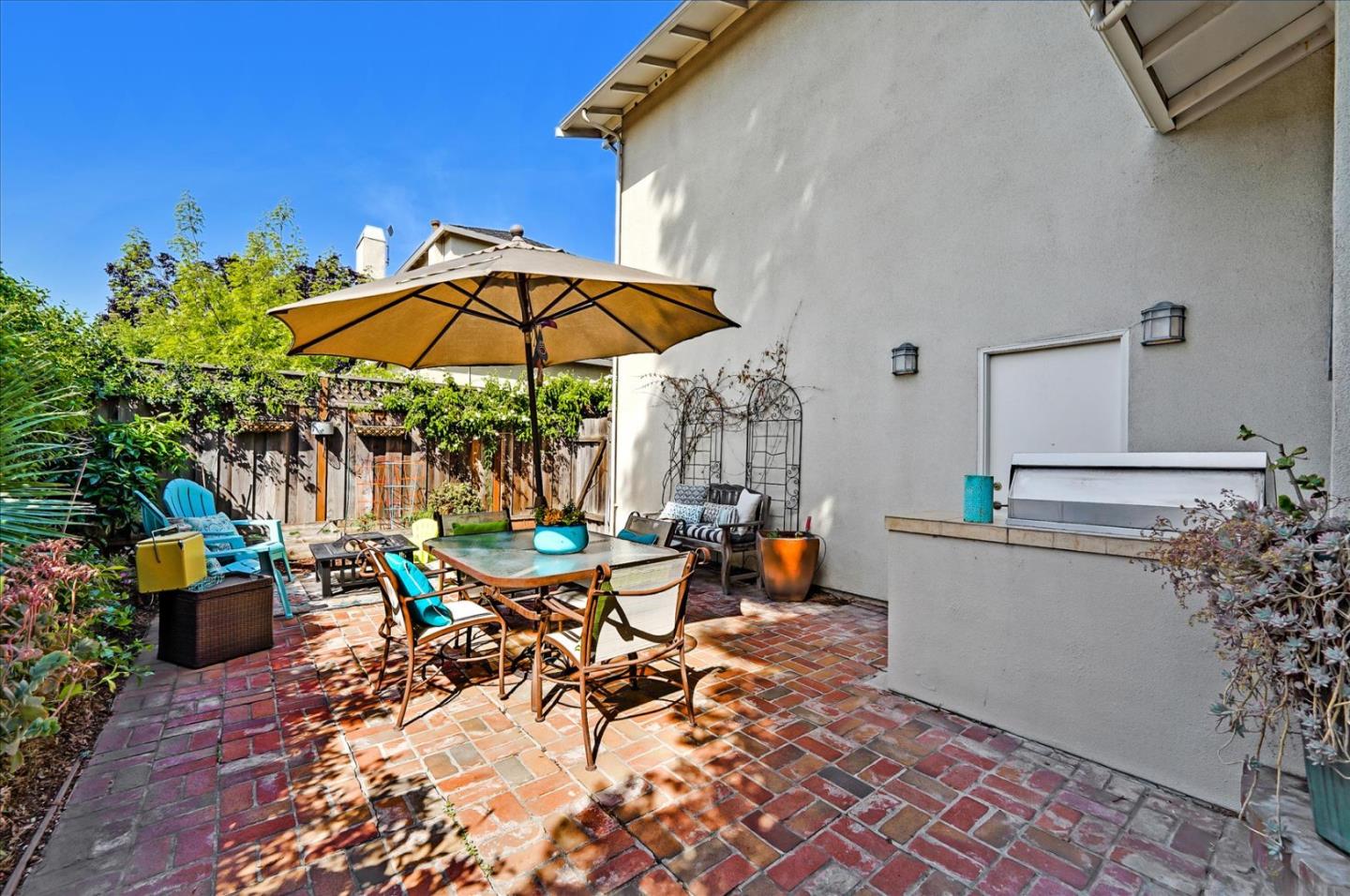 1166 Elysian Place San Jose, CA 95125 - Photo 36 of 46 an outdoor space with furniture and umbrella