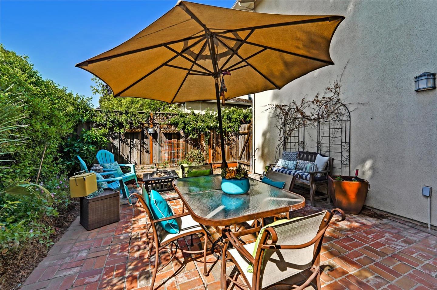 1166 Elysian Place San Jose, CA 95125 - Photo 41 of 46 a view of an outdoor sitting area with chairs and umbrella