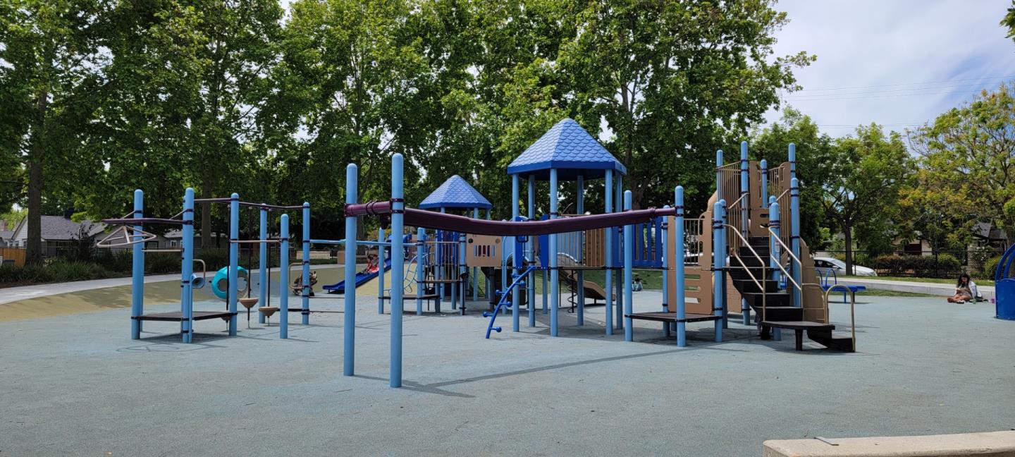 1166 Elysian Place San Jose, CA 95125 - Photo 45 of 46 a view of a house with large trees and wooden fence