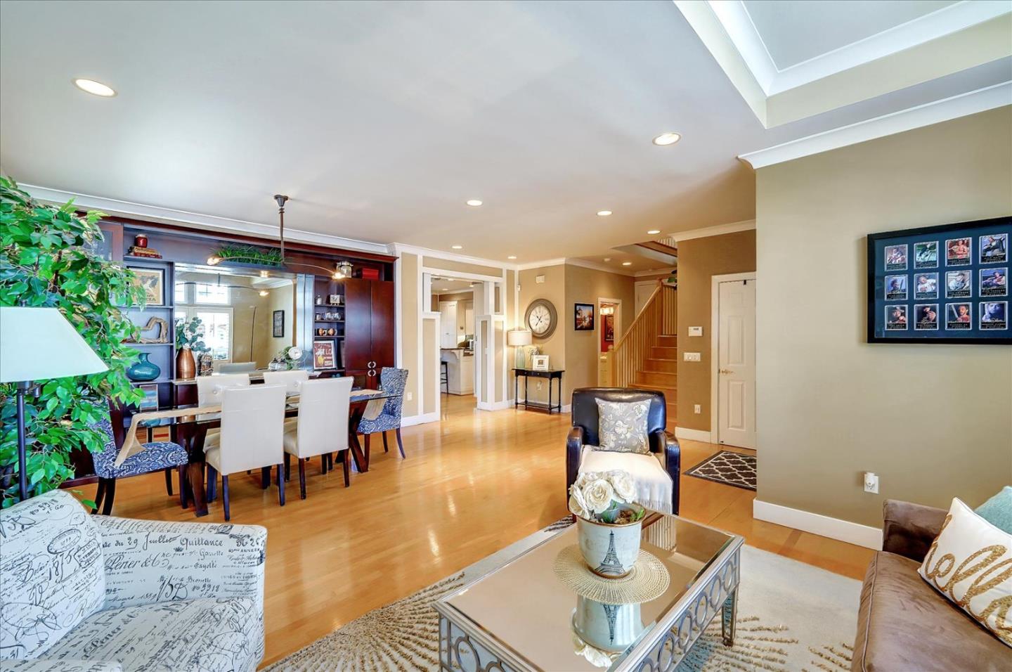1166 Elysian Place San Jose, CA 95125 - Photo 7 of 46 a living room with furniture dining table a window and potted plant