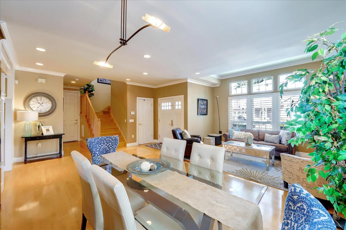 1166 Elysian Place San Jose, CA 95125 - Photo 8 of 46 a living room with furniture a large window and potted plants