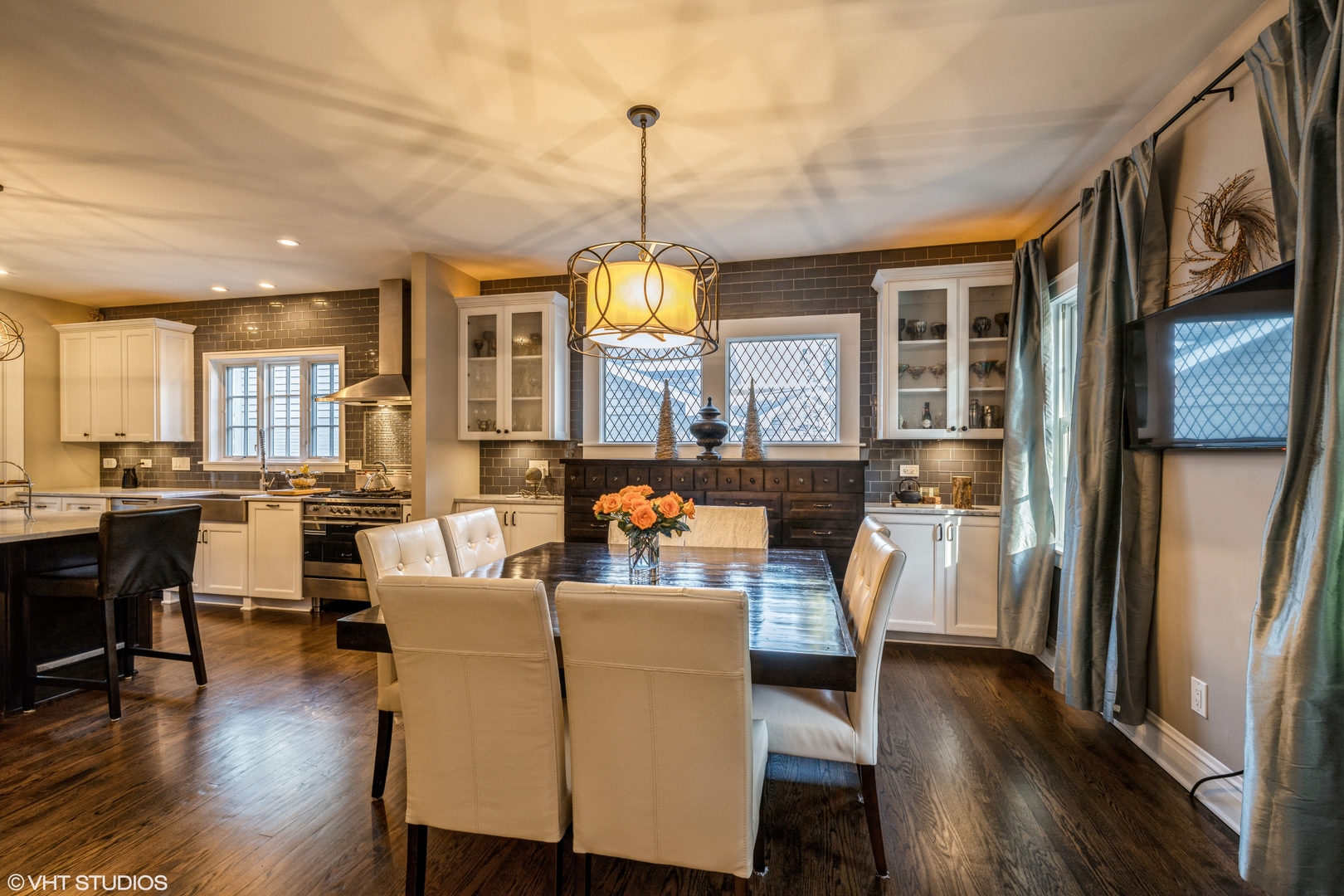217 Ravine Road Hinsdale, IL 60521 - Photo 11 of 53 a dining room with furniture a chandelier and wooden floor