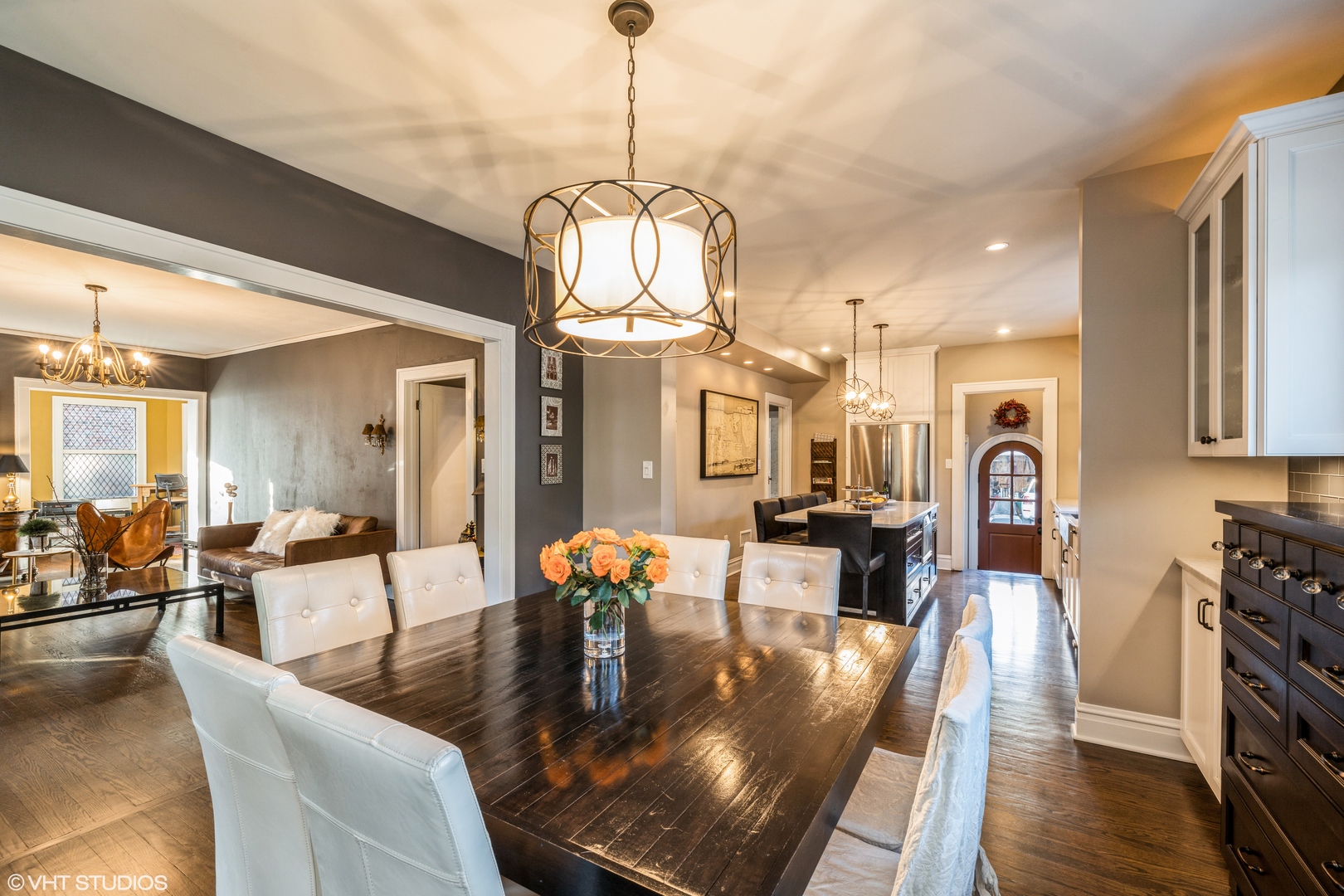 217 Ravine Road Hinsdale, IL 60521 - Photo 13 of 53 a view of a dining room and livingroom with furniture wooden floor a chandelier