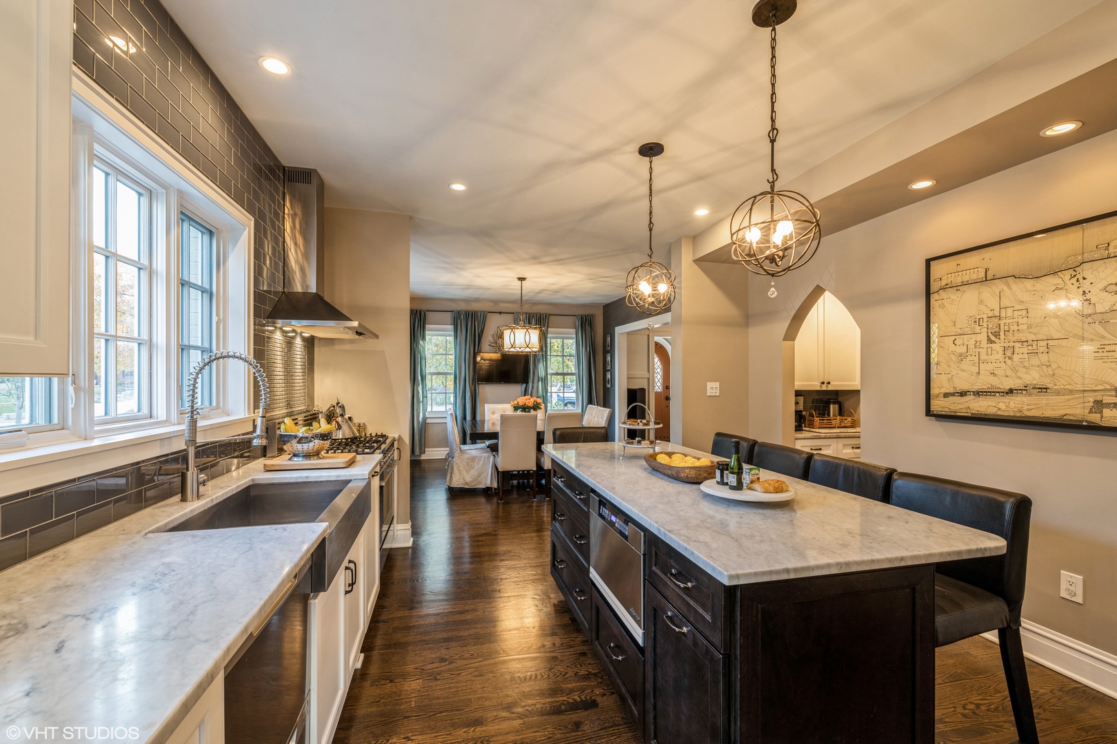 217 Ravine Road Hinsdale, IL 60521 - Photo 5 of 53 a kitchen with counter top space a sink appliances and living room view