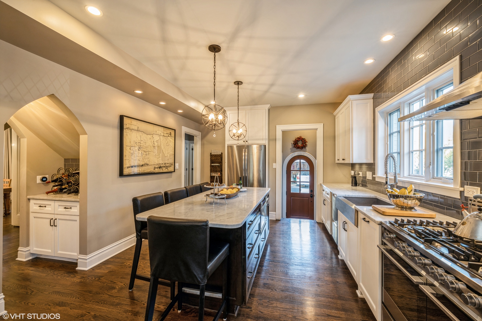 217 Ravine Road Hinsdale, IL 60521 - Photo 8 of 53 a large kitchen with a table and chairs
