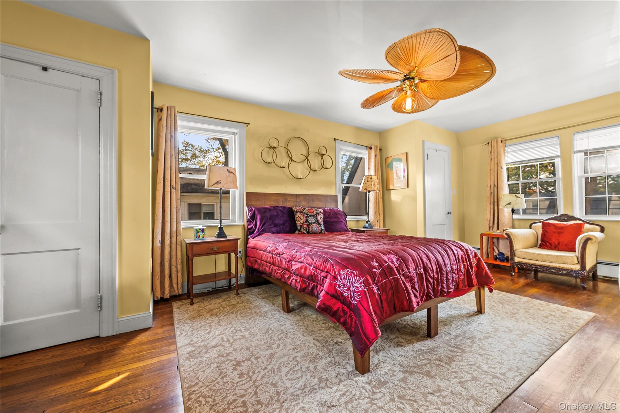 112-45 178th Street Queens, NY 11433 - Photo 13 of 24 a bedroom with a bed and wooden floor