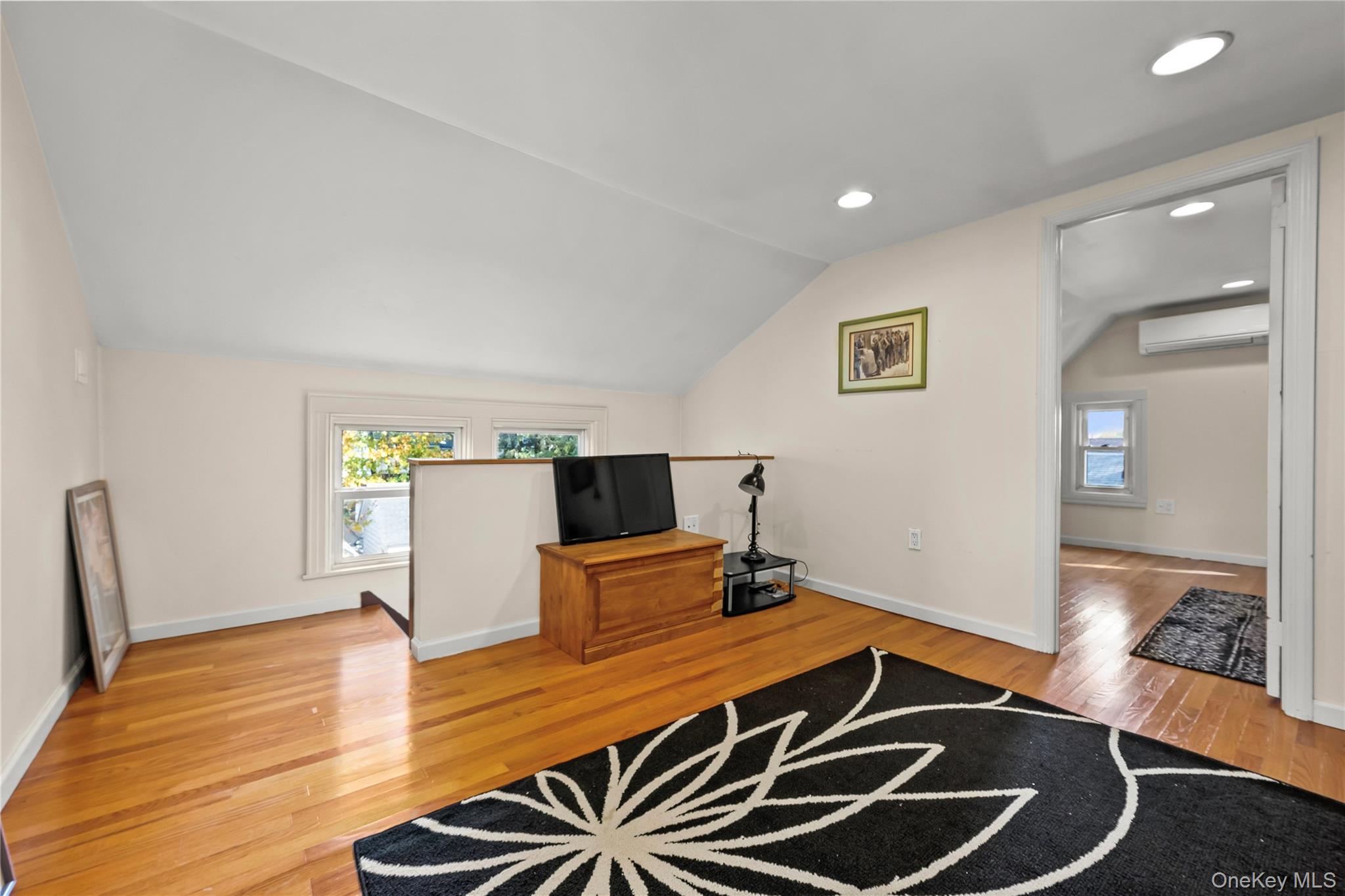 112-45 178th Street Queens, NY 11433 - Photo 17 of 24 a room with wooden floor pool table and chairs