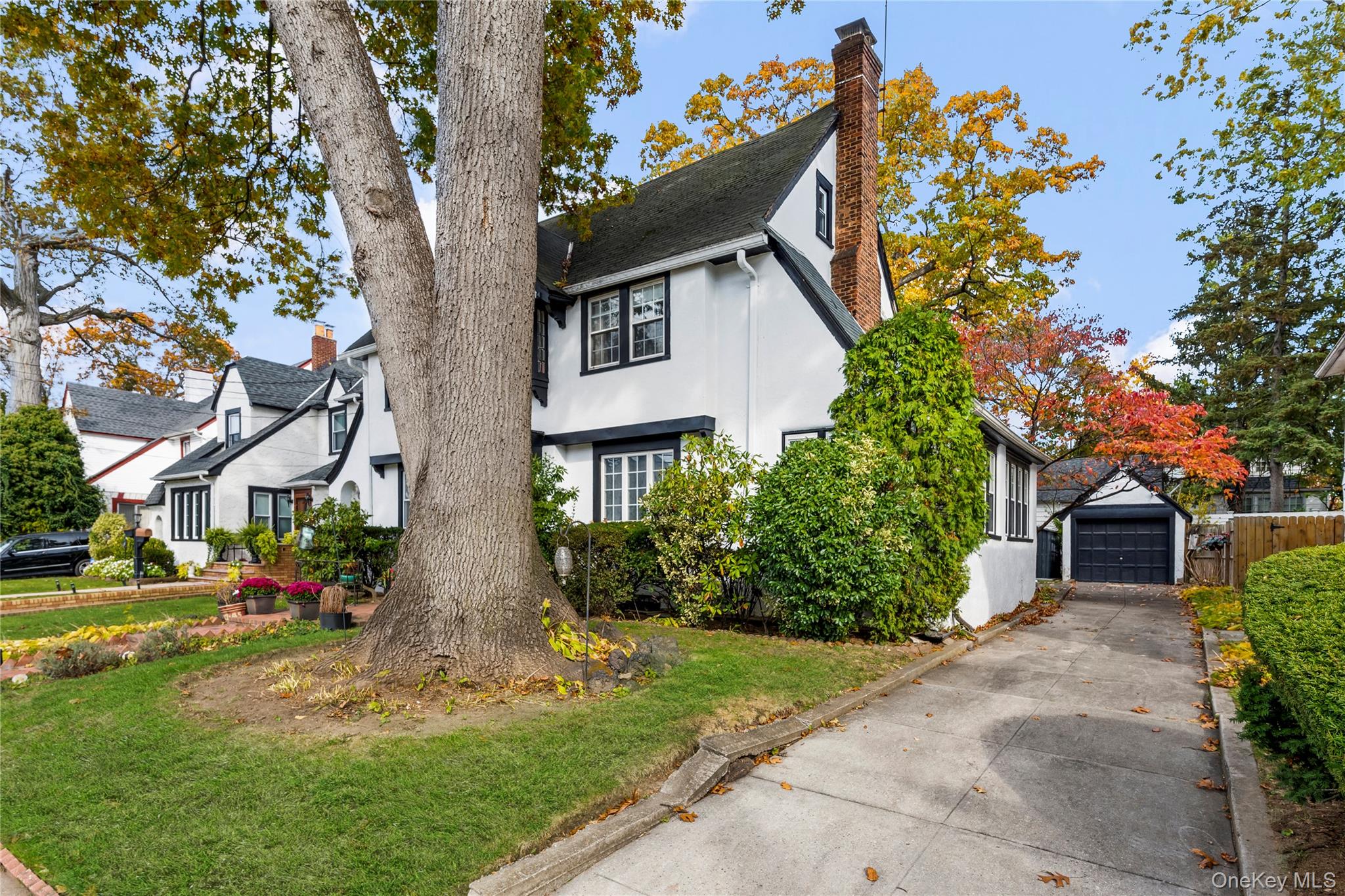 112-45 178th Street Queens, NY 11433 - Photo 2 of 24 a front view of a house with a yard