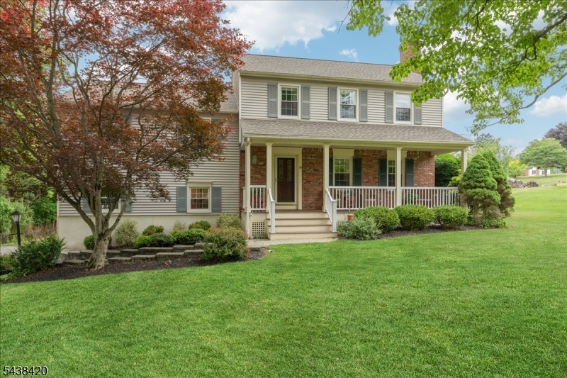 79 Main Street Califon, NJ 07830 - Photo 31 of 50 a front view of a house with a garden