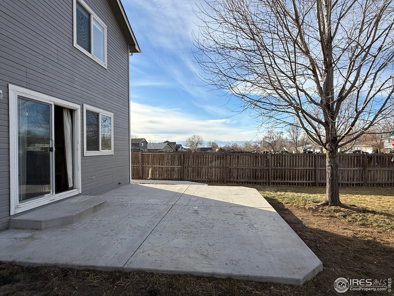 613 Sumac Street Frederick, CO 80530 - Photo 2 of 34 a swimming pool with wooden fence