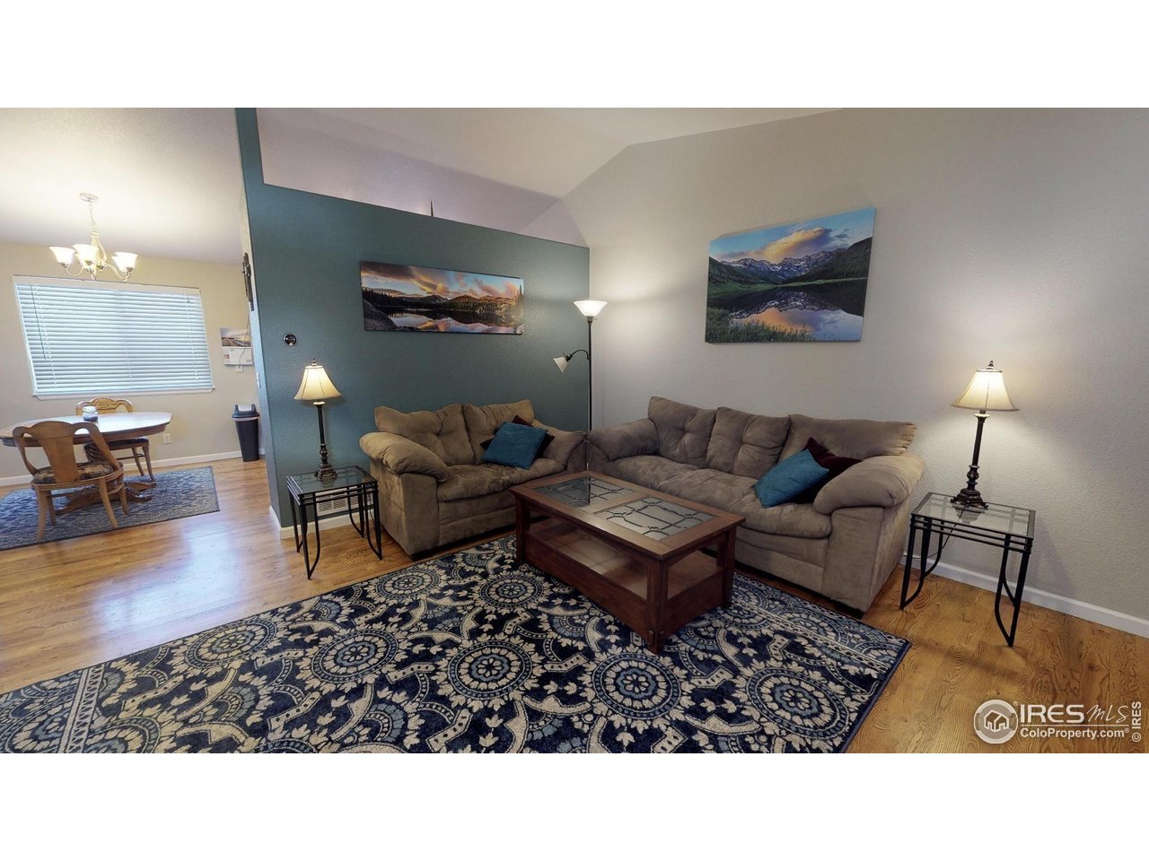 613 Sumac Street Frederick, CO 80530 - Photo 33 of 34 a living room with furniture and a wooden floor