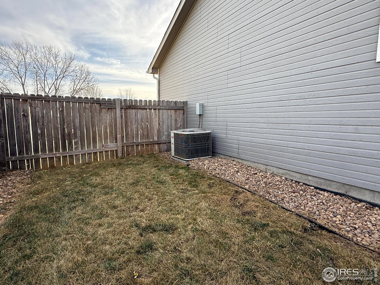 613 Sumac Street Frederick, CO 80530 - Photo 6 of 34 a view of a backyard