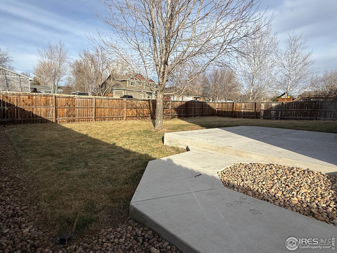 613 Sumac Street Frederick, CO 80530 - Photo 8 of 34 a view of a yard with snow on the road