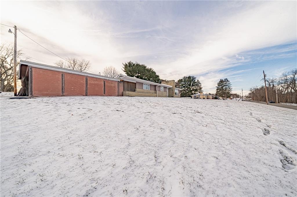 1316 Ridge Road Belle Vernon, PA 15012 - Photo 1 of 21 a view of a dry yard with a building