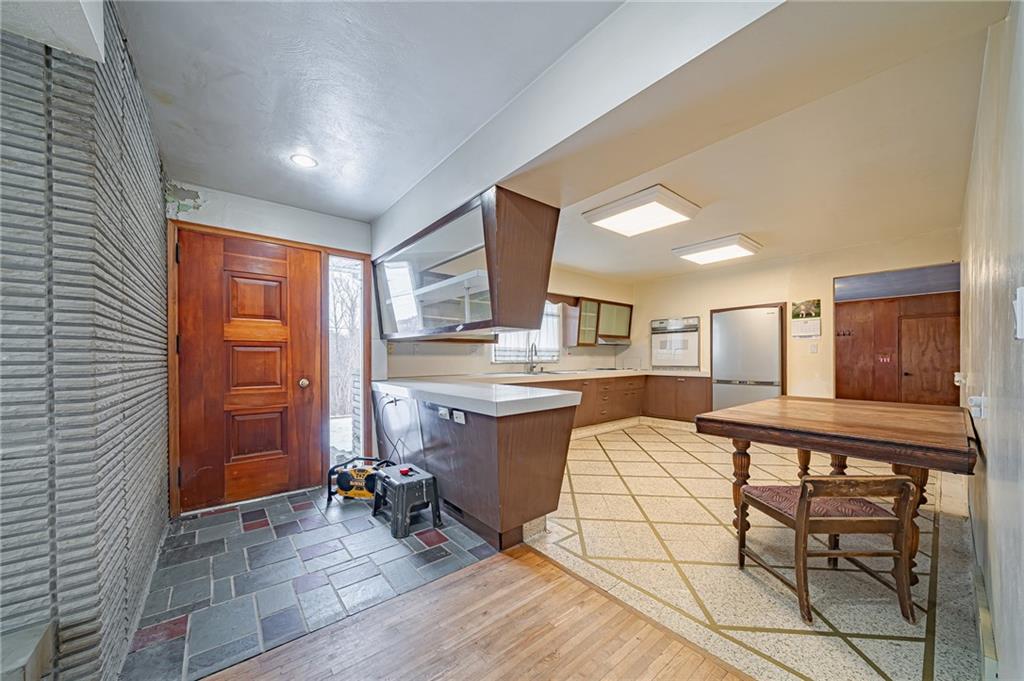 1316 Ridge Road Belle Vernon, PA 15012 - Photo 11 of 21 a view of a kitchen and dining room