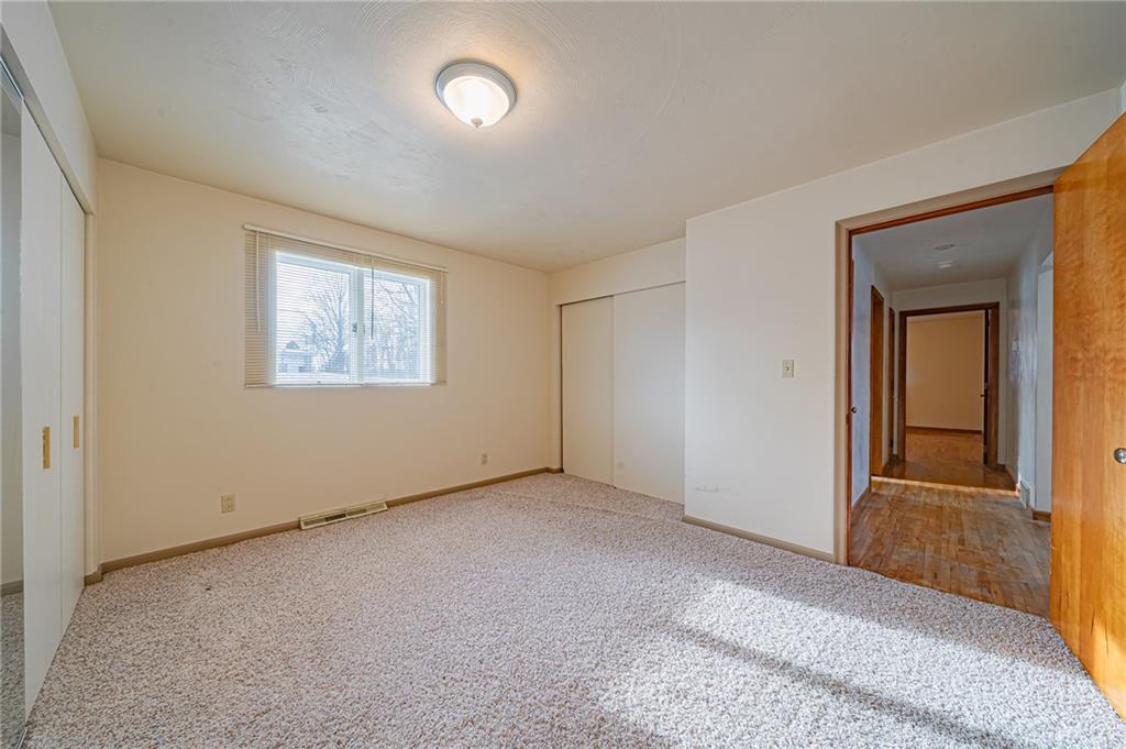 1316 Ridge Road Belle Vernon, PA 15012 - Photo 14 of 21 an empty room with windows