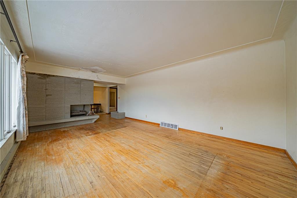 1316 Ridge Road Belle Vernon, PA 15012 - Photo 19 of 21 a view of empty room with wooden floor