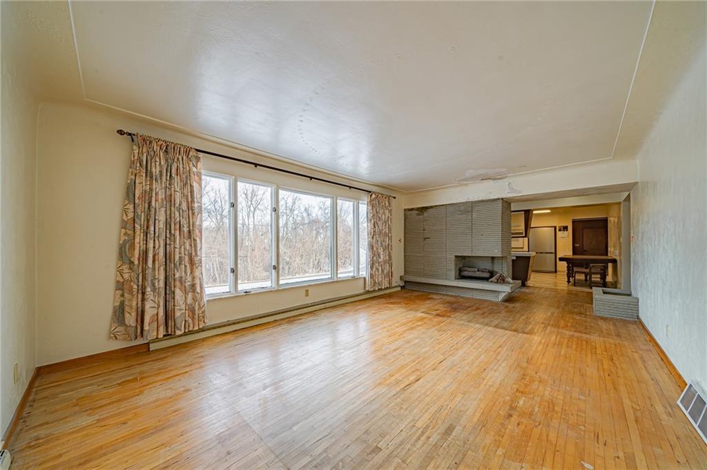1316 Ridge Road Belle Vernon, PA 15012 - Photo 20 of 21 a view of a livingroom with wooden floor and furniture