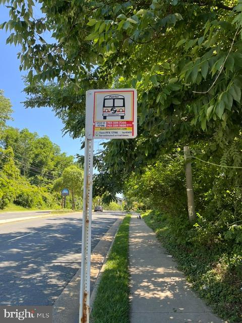 5448 Edsall Ridge Place Alexandria, VA 22312 - Photo 47 of 52 a sign that is on the side of a road