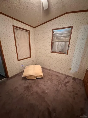 a bathroom with a sink mirror and vanity