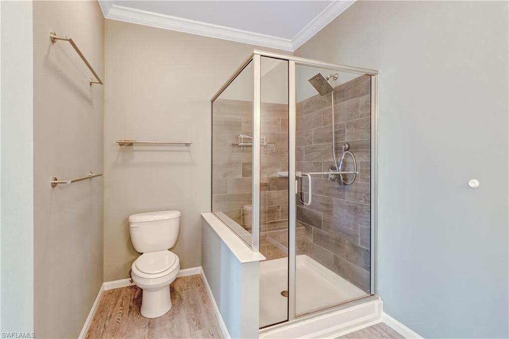4835 East Riverside Drive Fort Myers, FL 33905 - Photo 35 of 35 a bathroom with a toilet and a shower