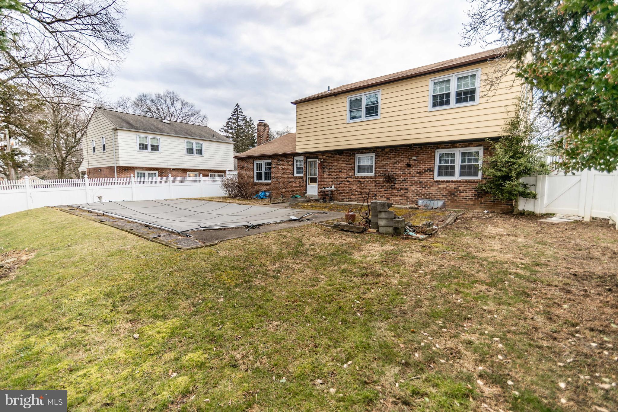 223 Wells Lane Springfield, PA 19064 - Photo 25 of 27 Fenced-in backyard with pool