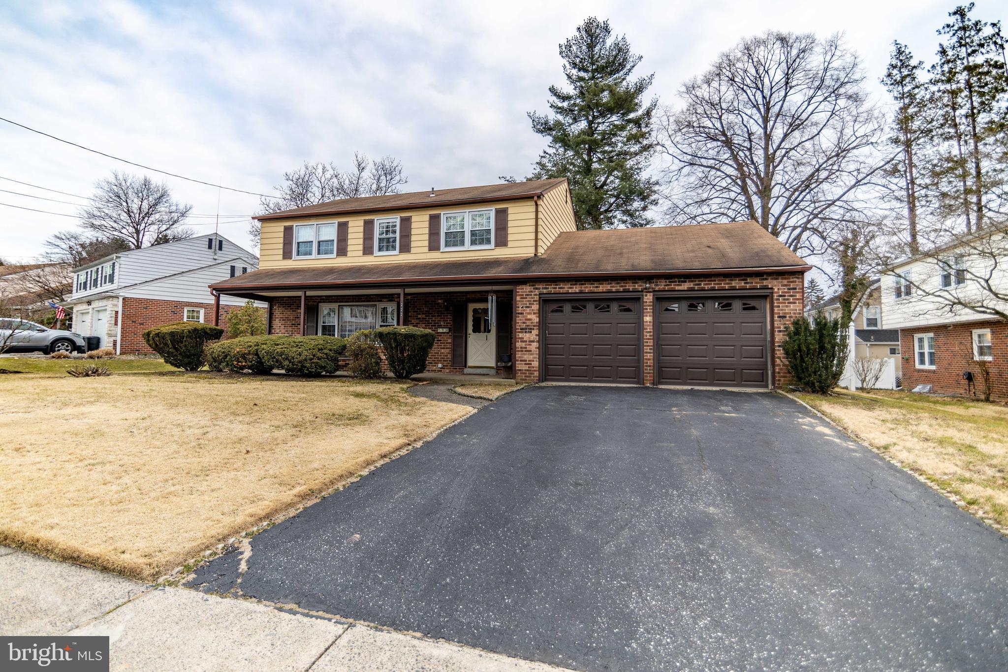 223 Wells Lane Springfield, PA 19064 - Photo 27 of 27 Two car garage and driveway parking