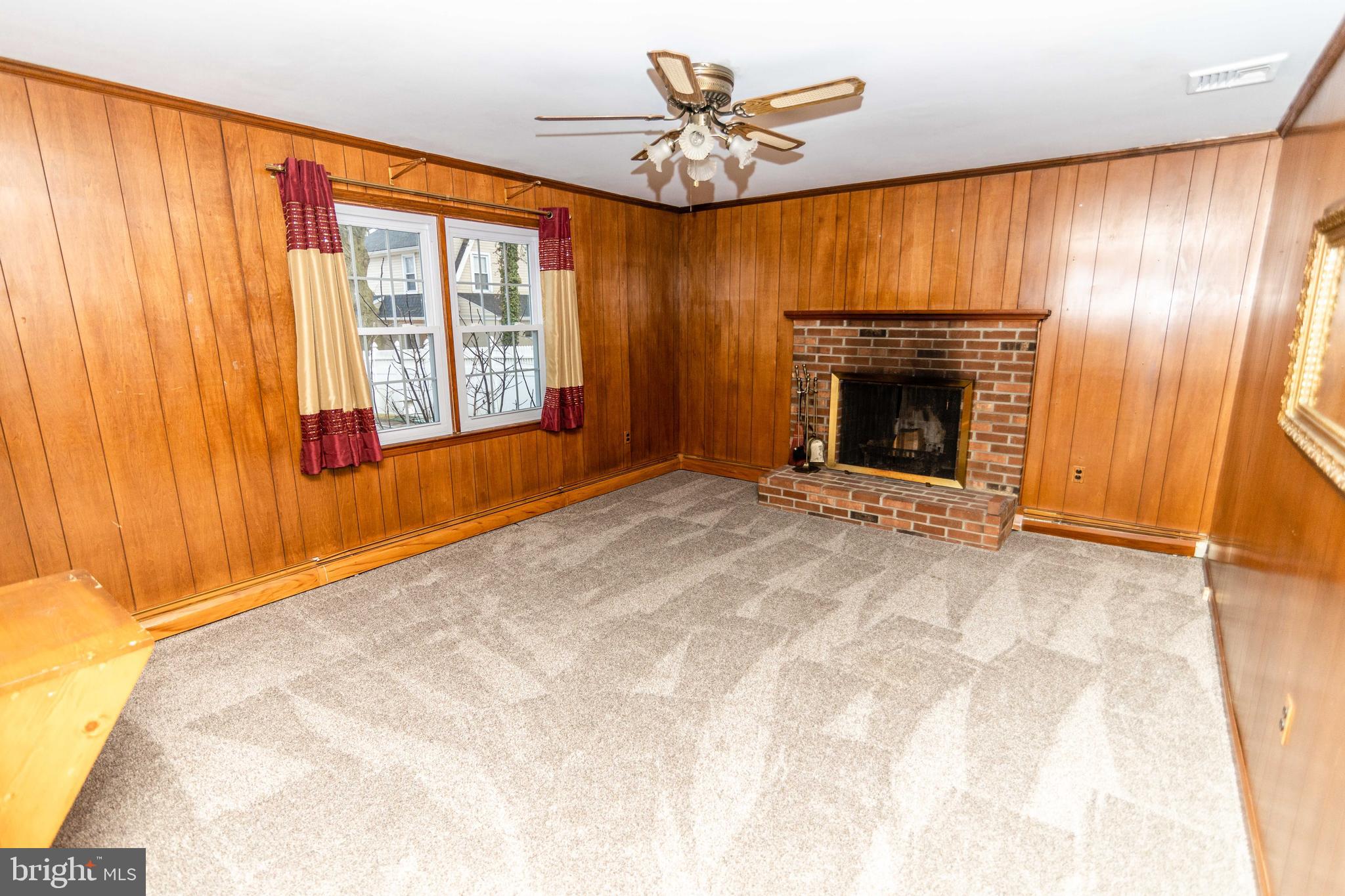 223 Wells Lane Springfield, PA 19064 - Photo 8 of 27 Family Room with fireplace