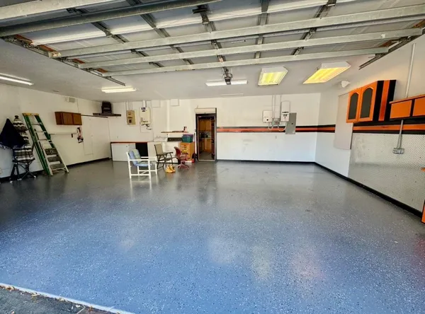 a view of a kitchen with furniture and a kitchen